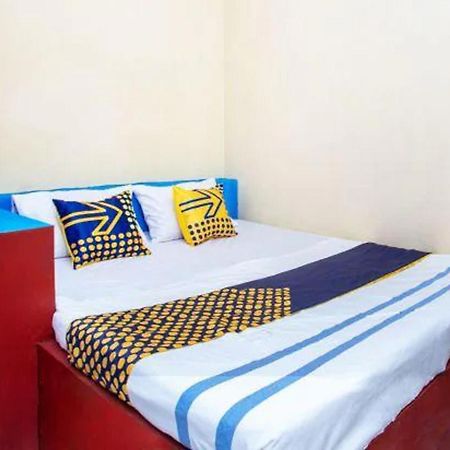 Spot On 2473 Buana Jaya Guest House Cilacap Buitenkant foto